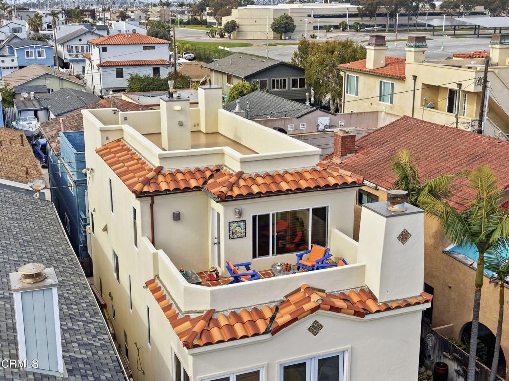 137 Fillmore Avenue Oxnard, CA 93035 - Photo 3 of 73 an aerial view of a house with roof deck and furniture