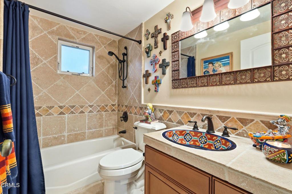 137 Fillmore Avenue Oxnard, CA 93035 - Photo 34 of 73 a bathroom with a sink a toilet and shower