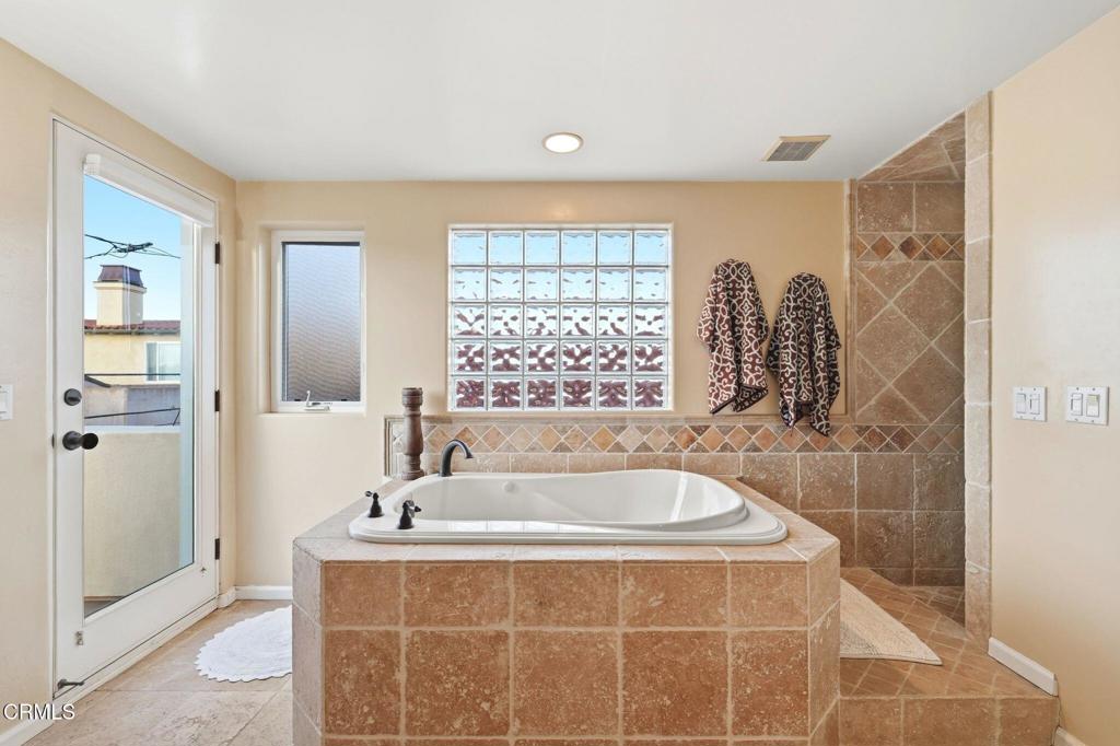 137 Fillmore Avenue Oxnard, CA 93035 - Photo 42 of 73 a bath tub sitting next to a window