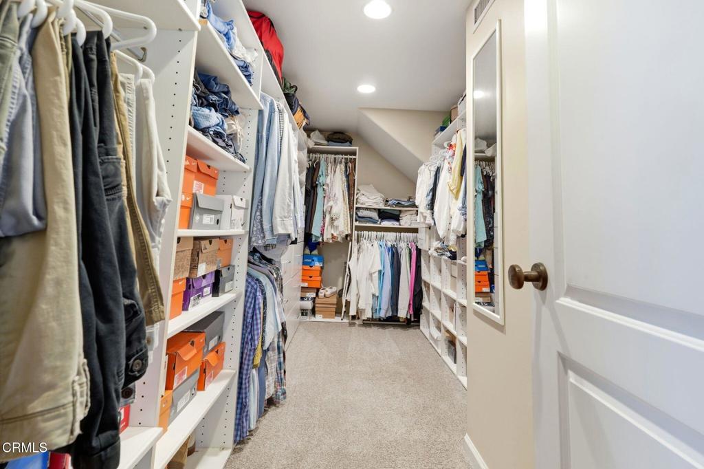 137 Fillmore Avenue Oxnard, CA 93035 - Photo 46 of 73 a view of walk in closet with clothes and shoes