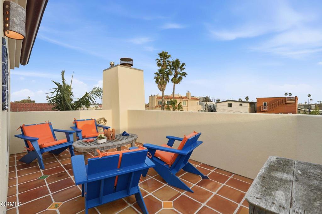 137 Fillmore Avenue Oxnard, CA 93035 - Photo 47 of 73 a terrace of a house with outdoor seating