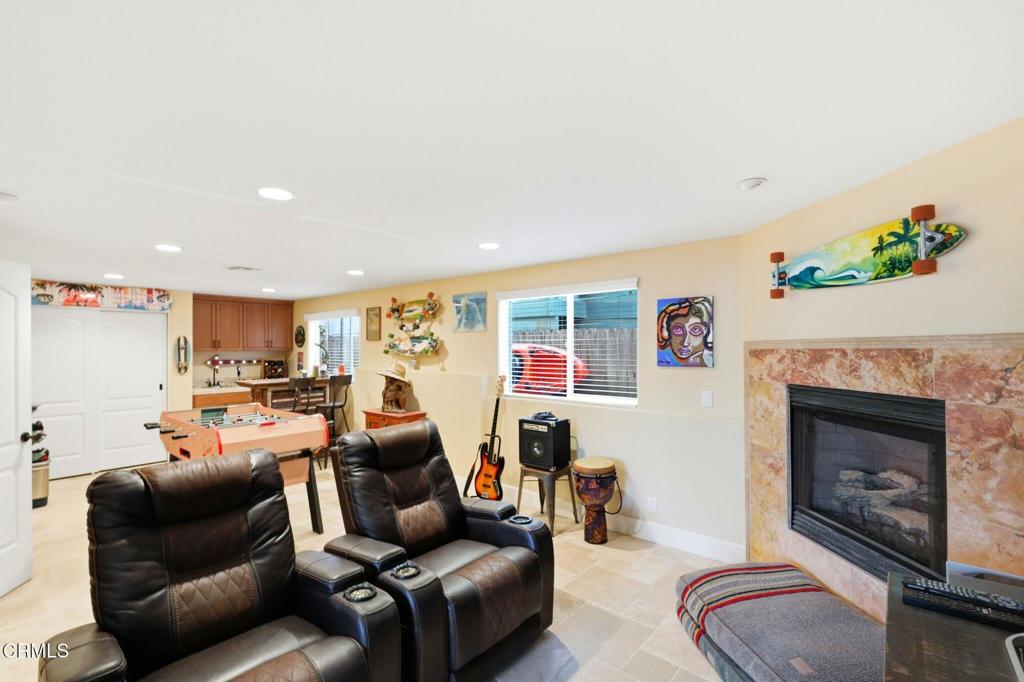 137 Fillmore Avenue Oxnard, CA 93035 - Photo 10 of 73 a living room with furniture or fireplace and a fireplace