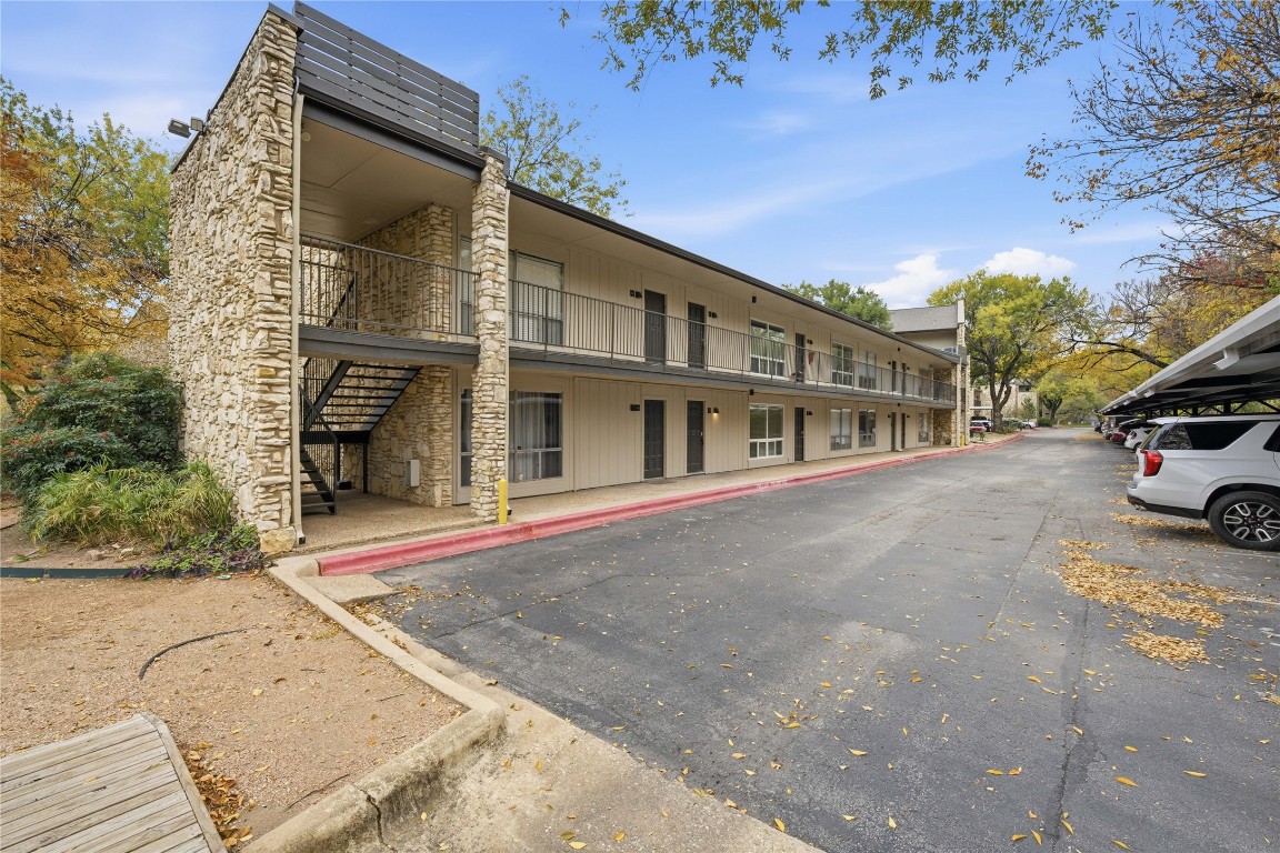 500 East Riverside Drive, Unit 133 Austin, TX 78704 - Photo 28 of 38 a view of building with car parked