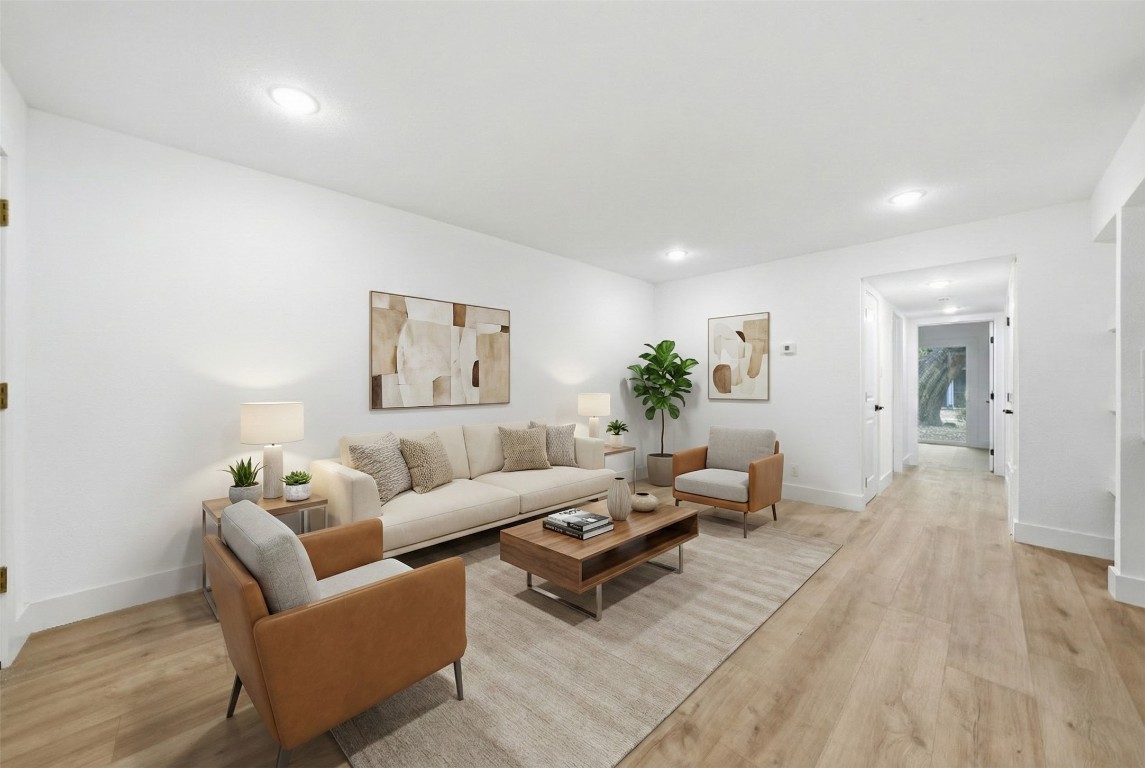 500 East Riverside Drive, Unit 133 Austin, TX 78704 - Photo 5 of 38 a living room with furniture and wooden floor