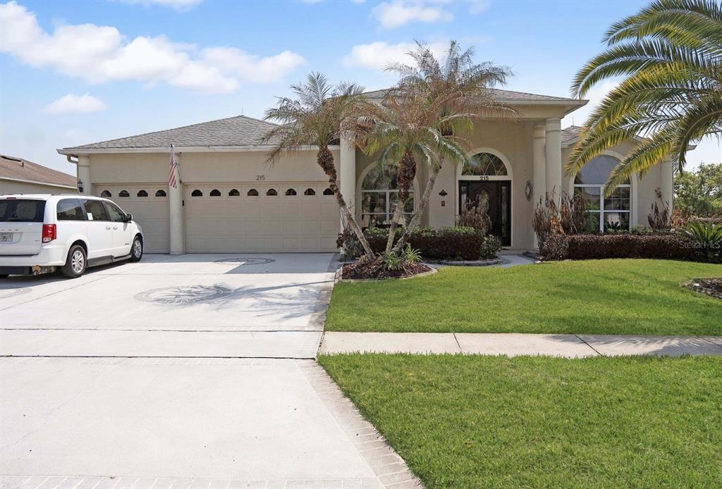 215 Strathmore Circle Kissimmee, FL 34744 - Photo 1 of 24 a view of house with yard and entertaining space