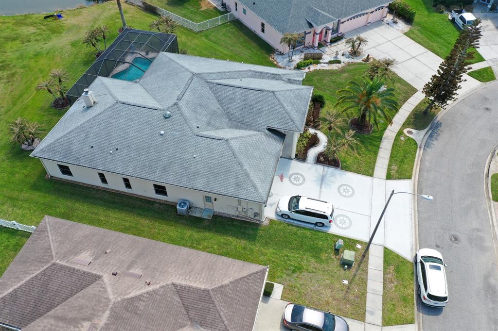 215 Strathmore Circle Kissimmee, FL 34744 - Photo 22 of 24 an aerial view of a house with a backyard