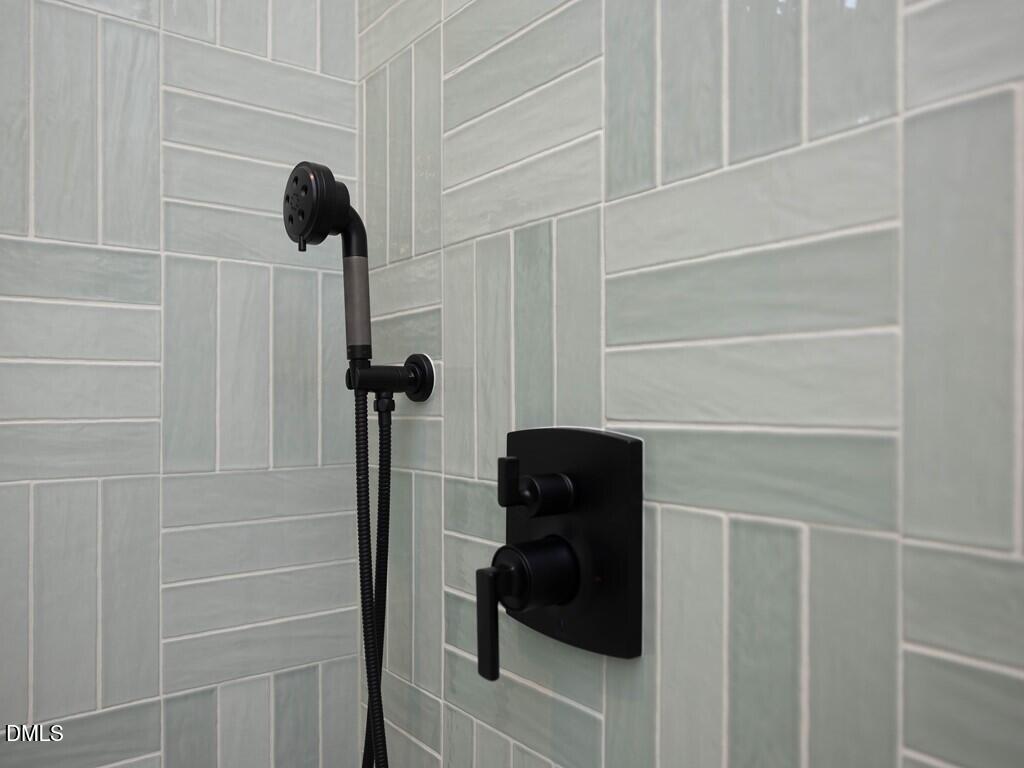 7013 Buckhead Drive Raleigh, NC 27615 - Photo 39 of 80 a bathroom with a shower