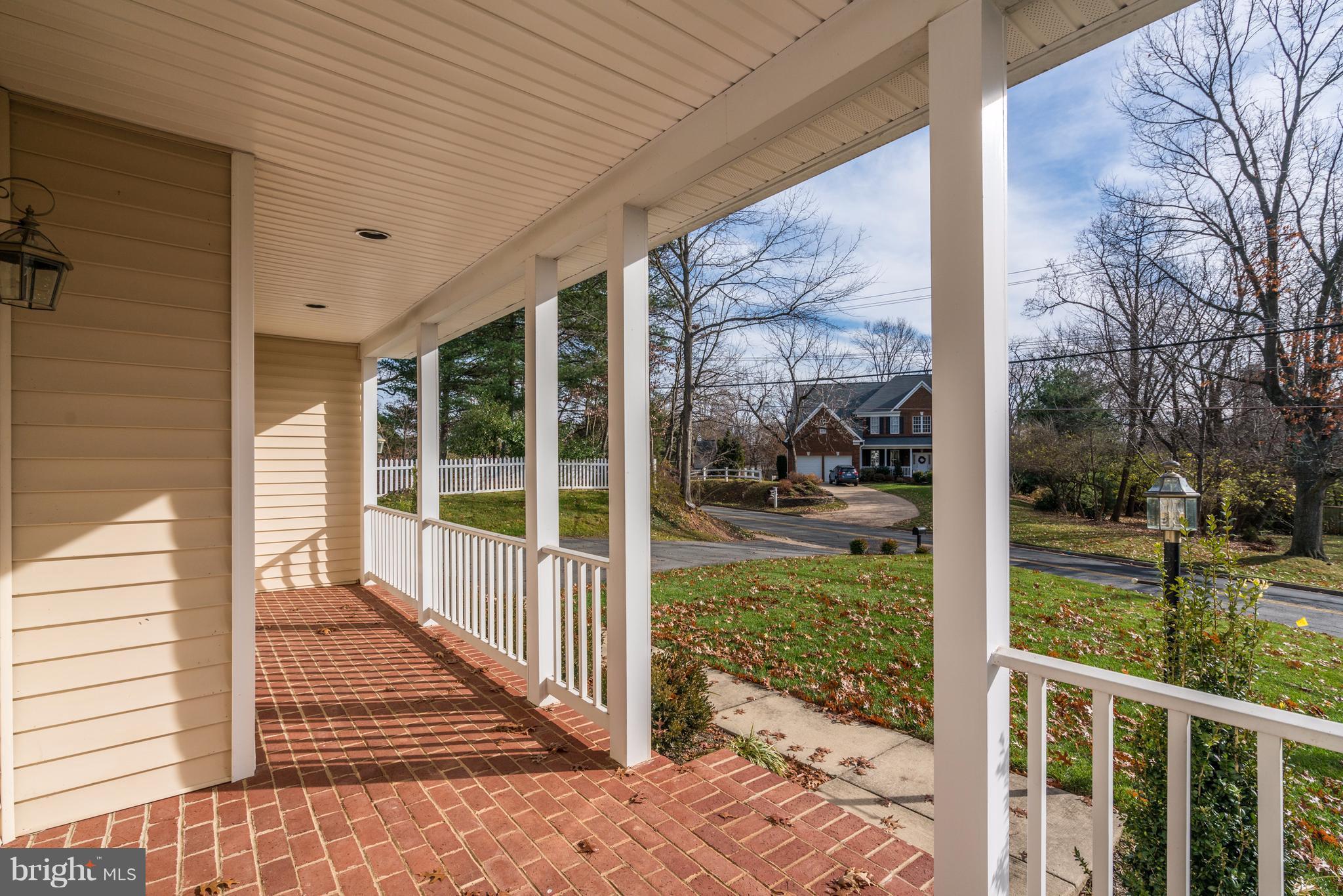 529 Malcolm Road Northwest Vienna, VA 22180 - Photo 2 of 30 Front porch with brick floor