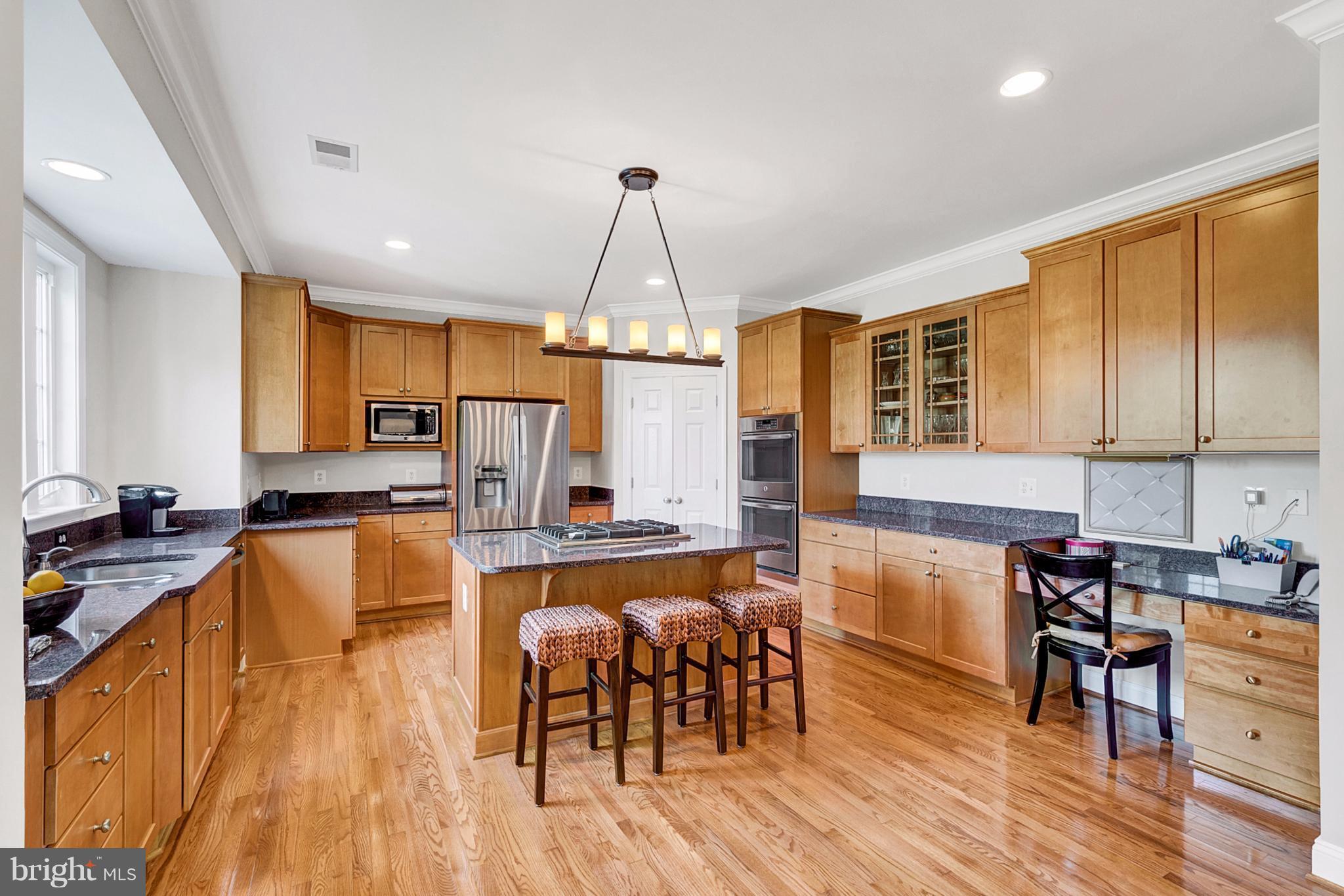 529 Malcolm Road Northwest Vienna, VA 22180 - Photo 13 of 30 Shaker style cabinets, granite counters
