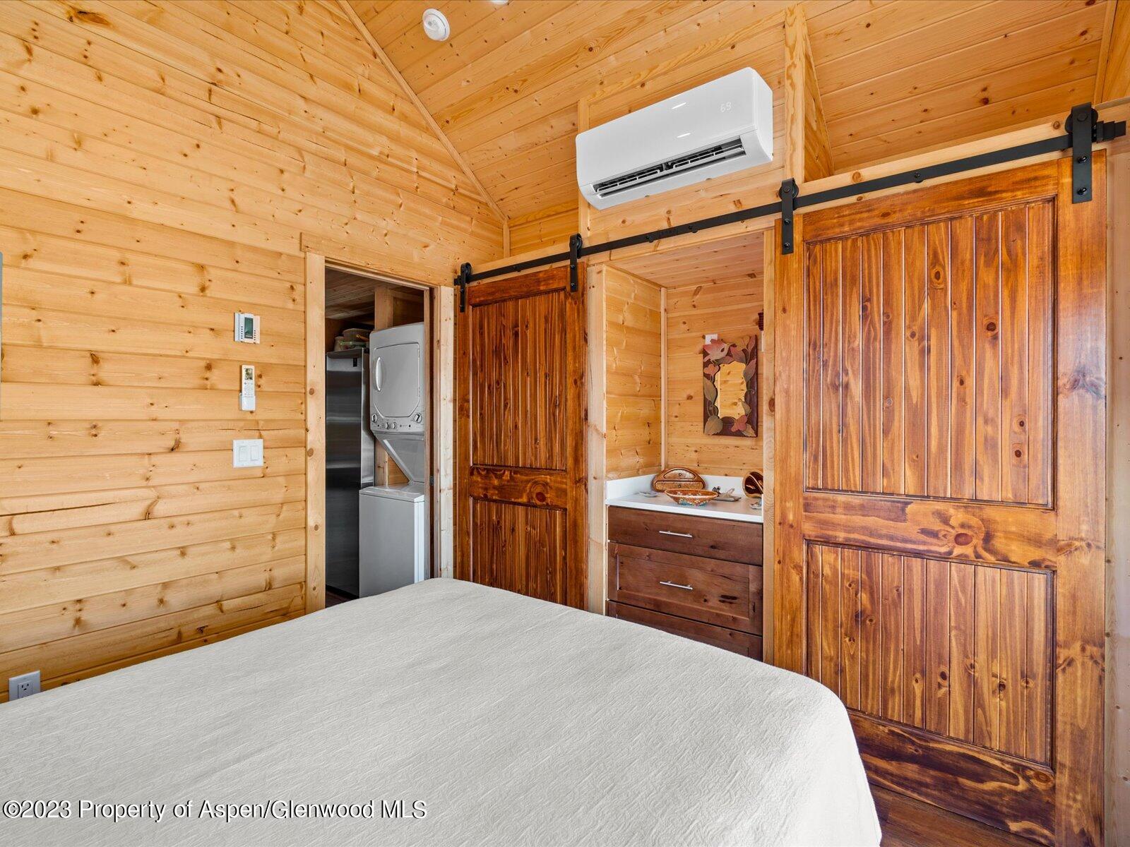 329 River Frontage Road, Unit 8 Silt, CO 81652 - Photo 13 of 24 a bedroom with a bed and a dresser