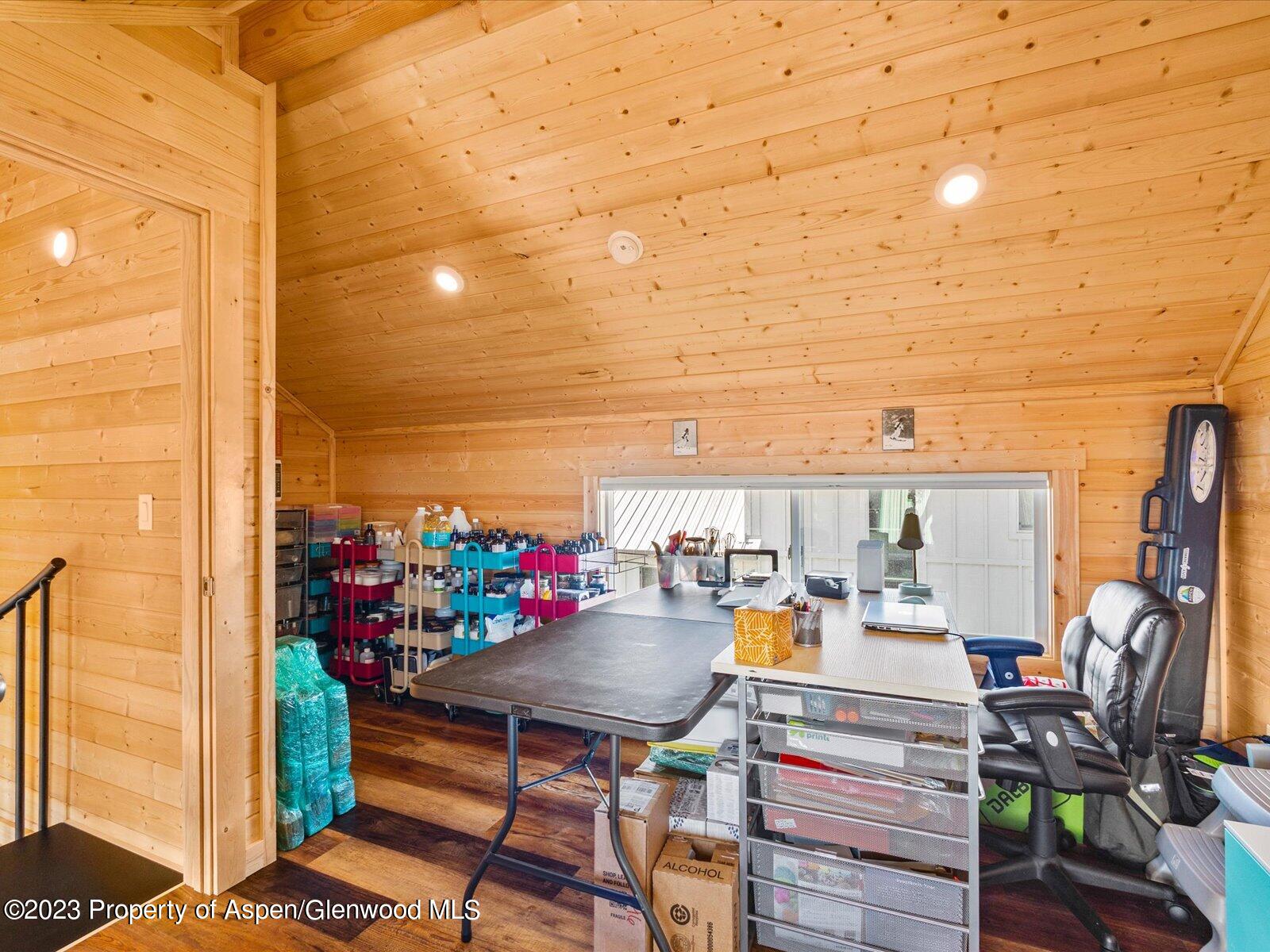 329 River Frontage Road, Unit 8 Silt, CO 81652 - Photo 17 of 24 a view of a balcony with dining table and chairs