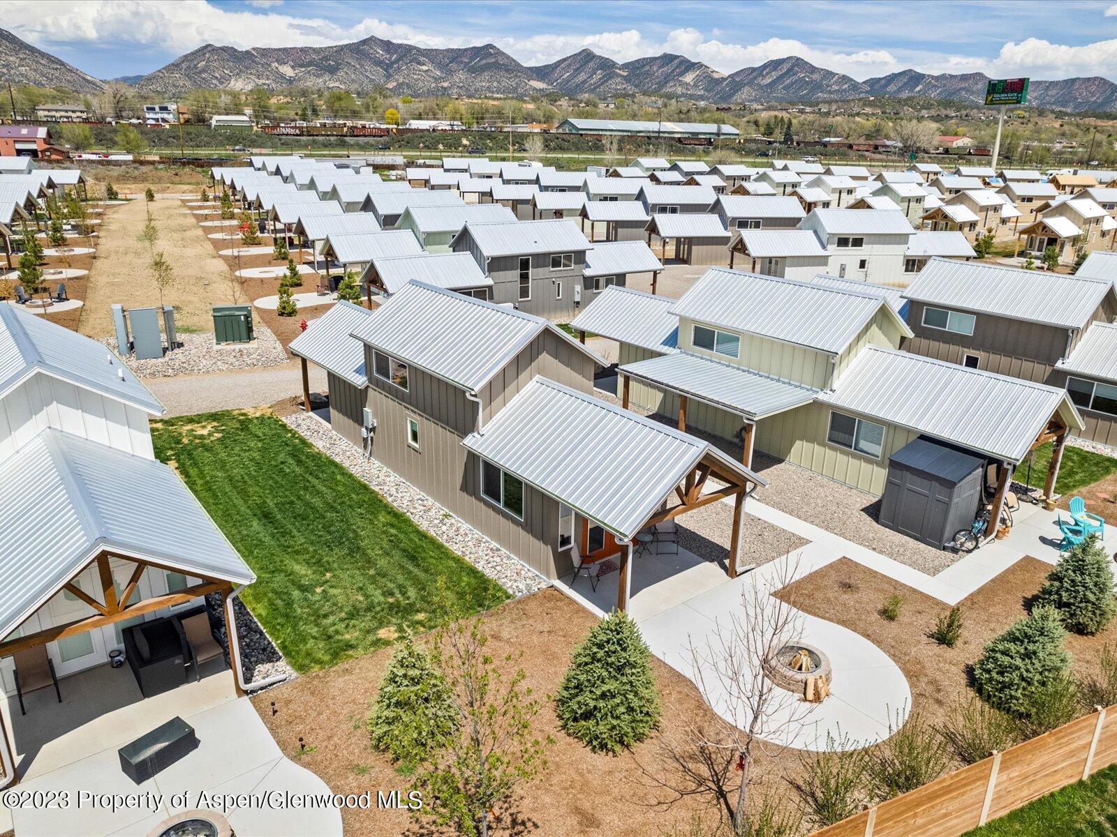 329 River Frontage Road, Unit 8 Silt, CO 81652 - Photo 21 of 24 an aerial view of a house with a lake view