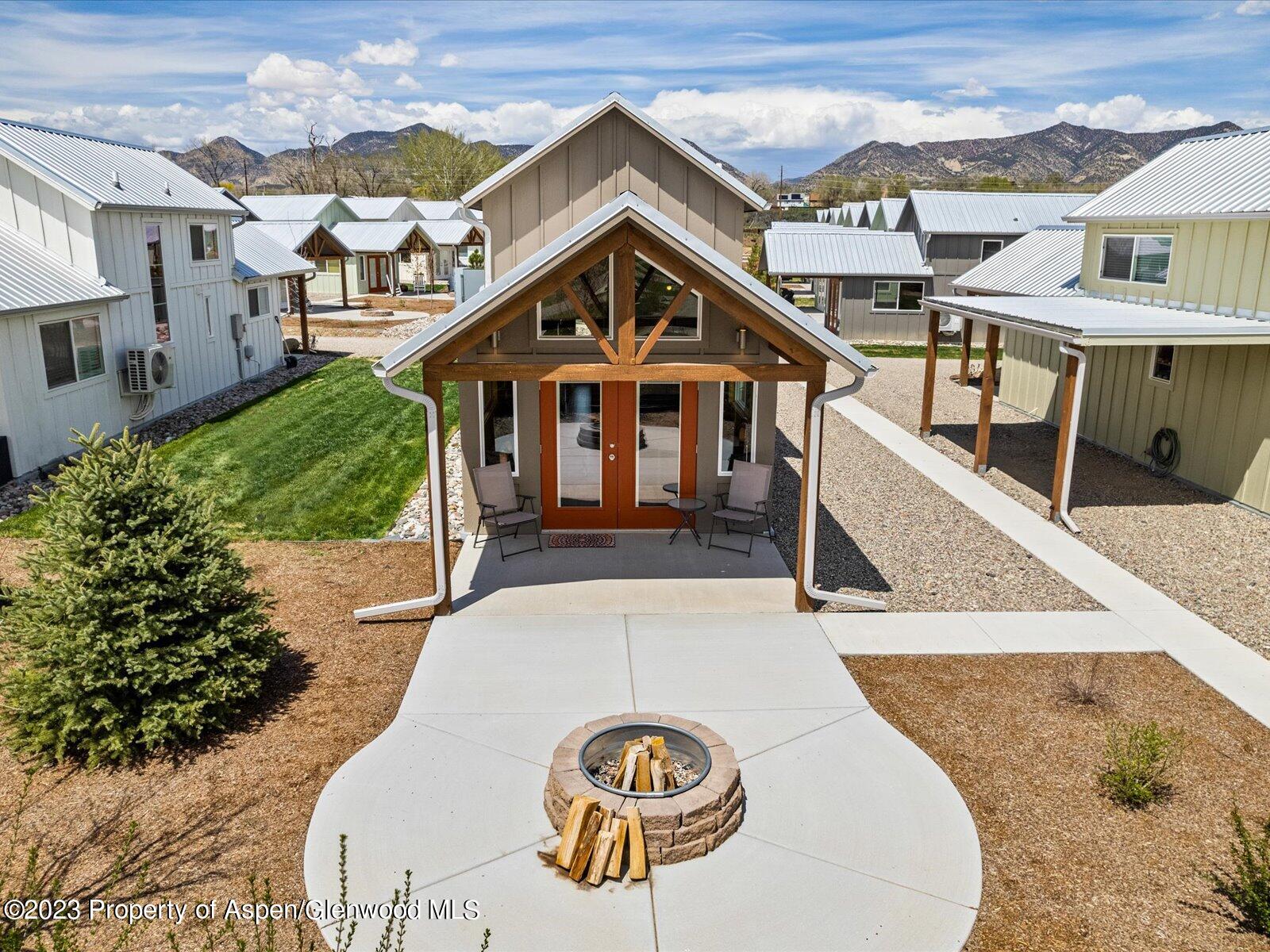 329 River Frontage Road, Unit 8 Silt, CO 81652 - Photo 4 of 24 a view of a house with a yard porch and furniture