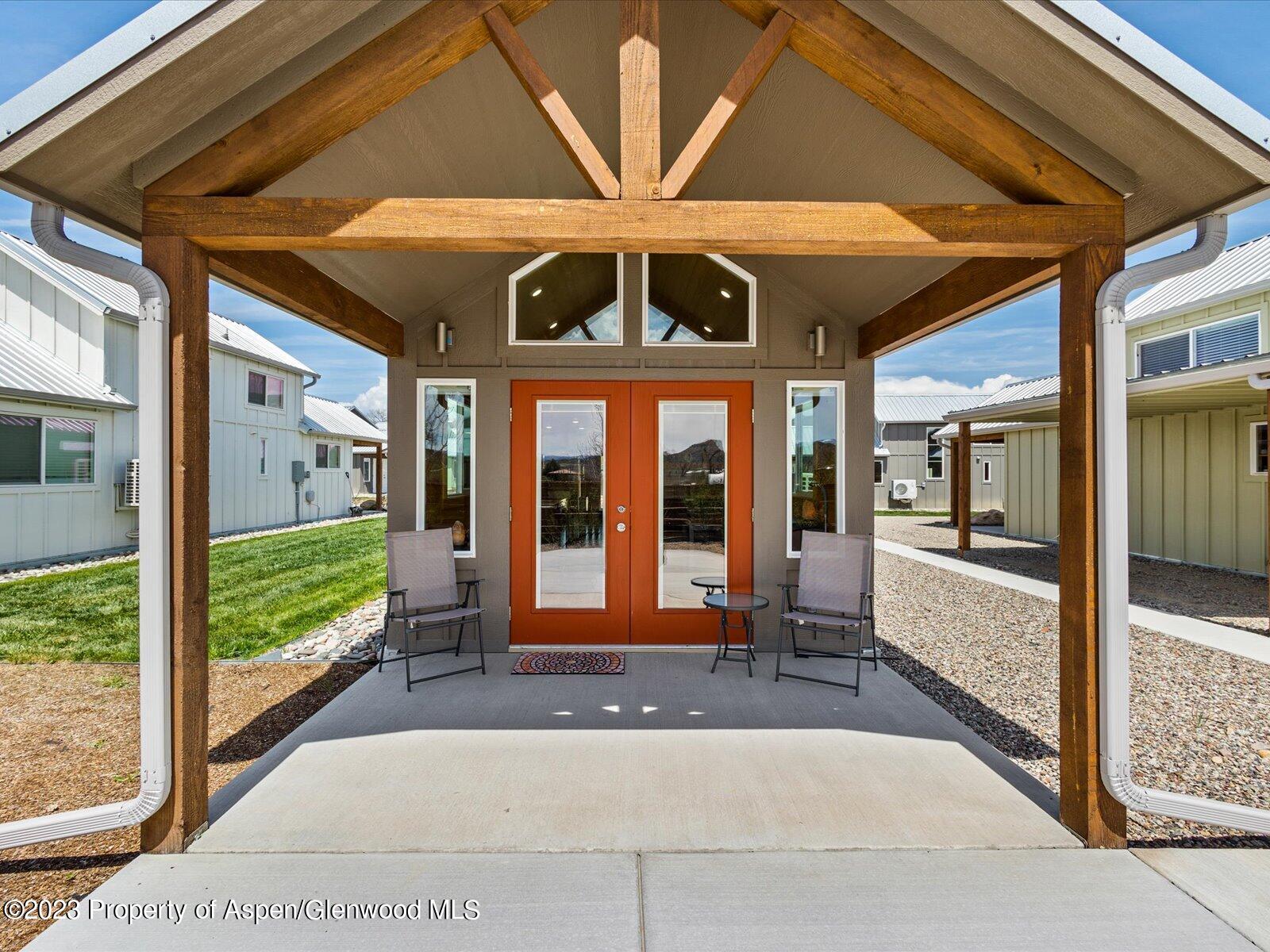 329 River Frontage Road, Unit 8 Silt, CO 81652 - Photo 5 of 24 a front view of a house with a porch