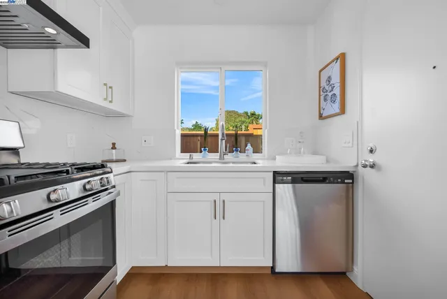 a view of a livingroom with furniture and a fireplace