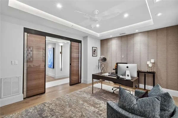 a living room with furniture and a table