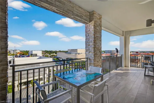 a view of a balcony with city view
