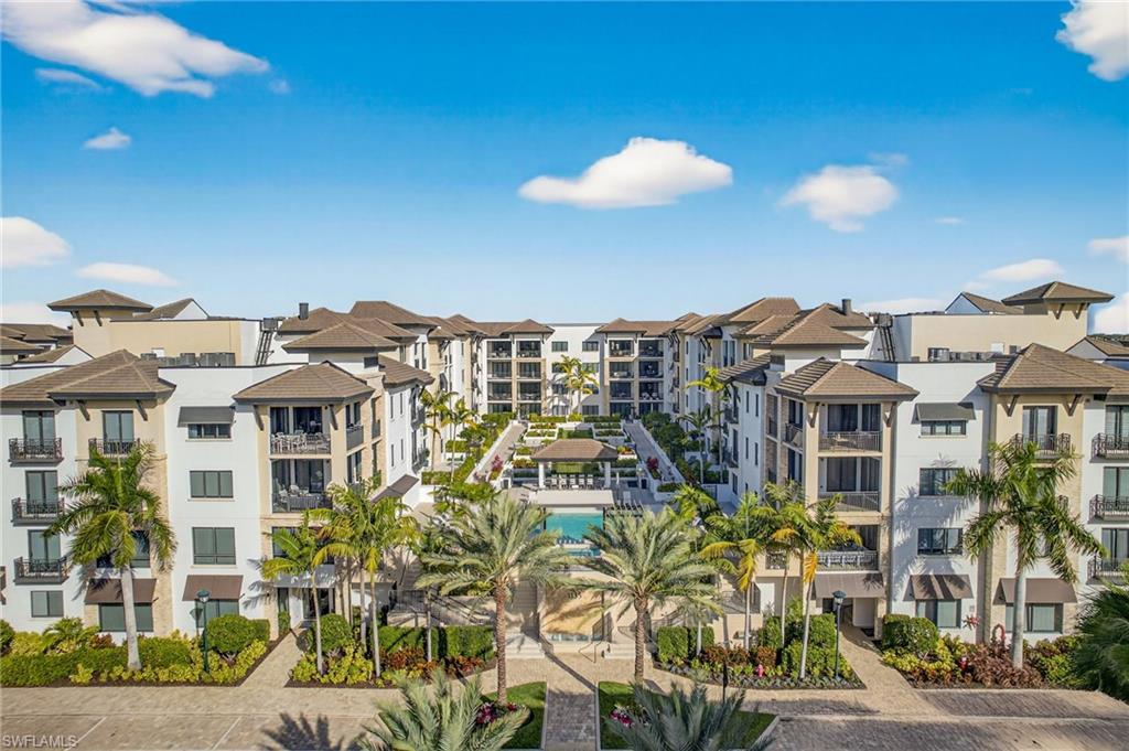 1135 3rd Avenue South, Unit 521 Naples, FL 34102 - Photo 35 of 39 a view of a city with tall buildings