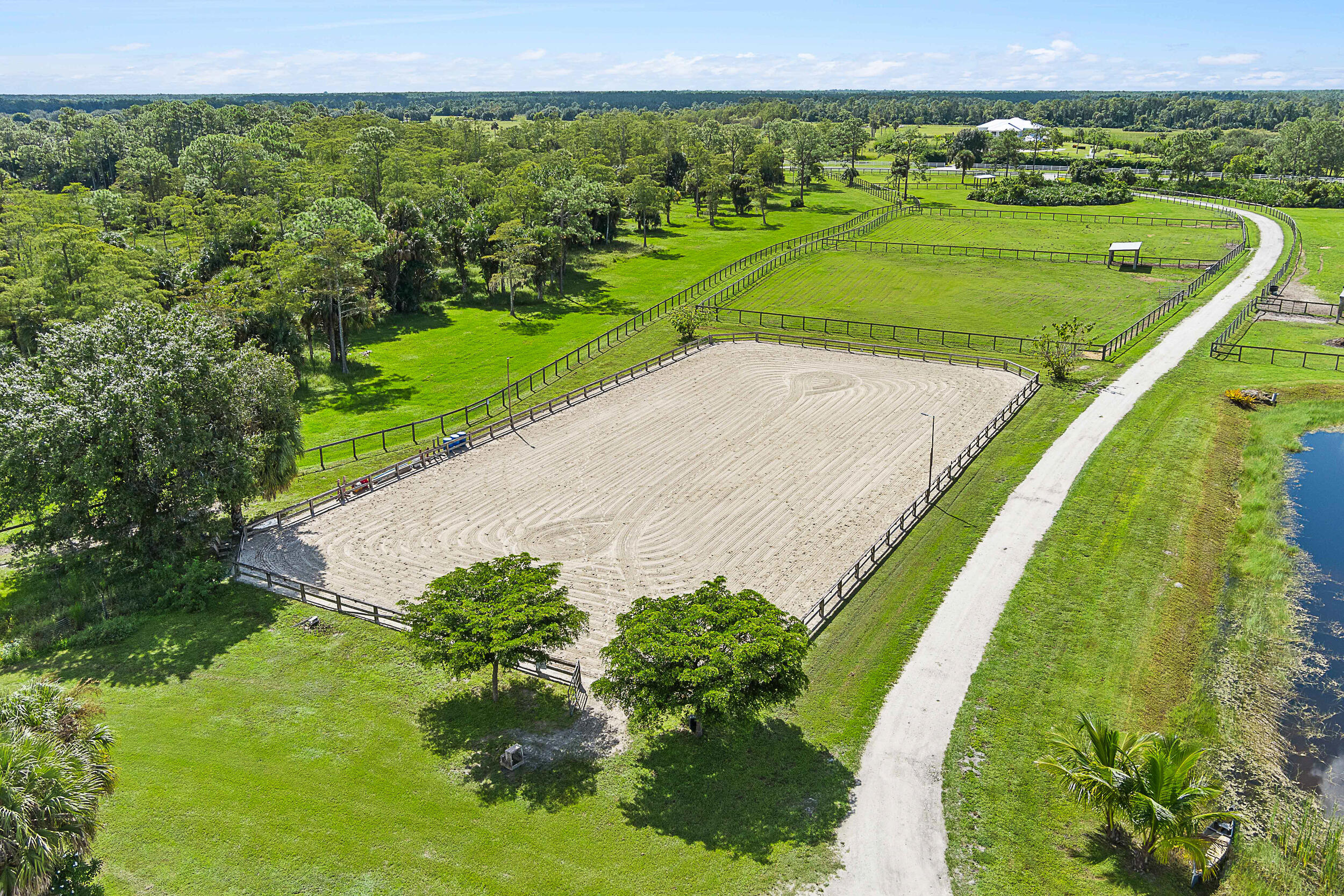 2986 Southwest Trailside Path Stuart, FL 34997 - Photo 23 of 40 a view of a golf course with a garden