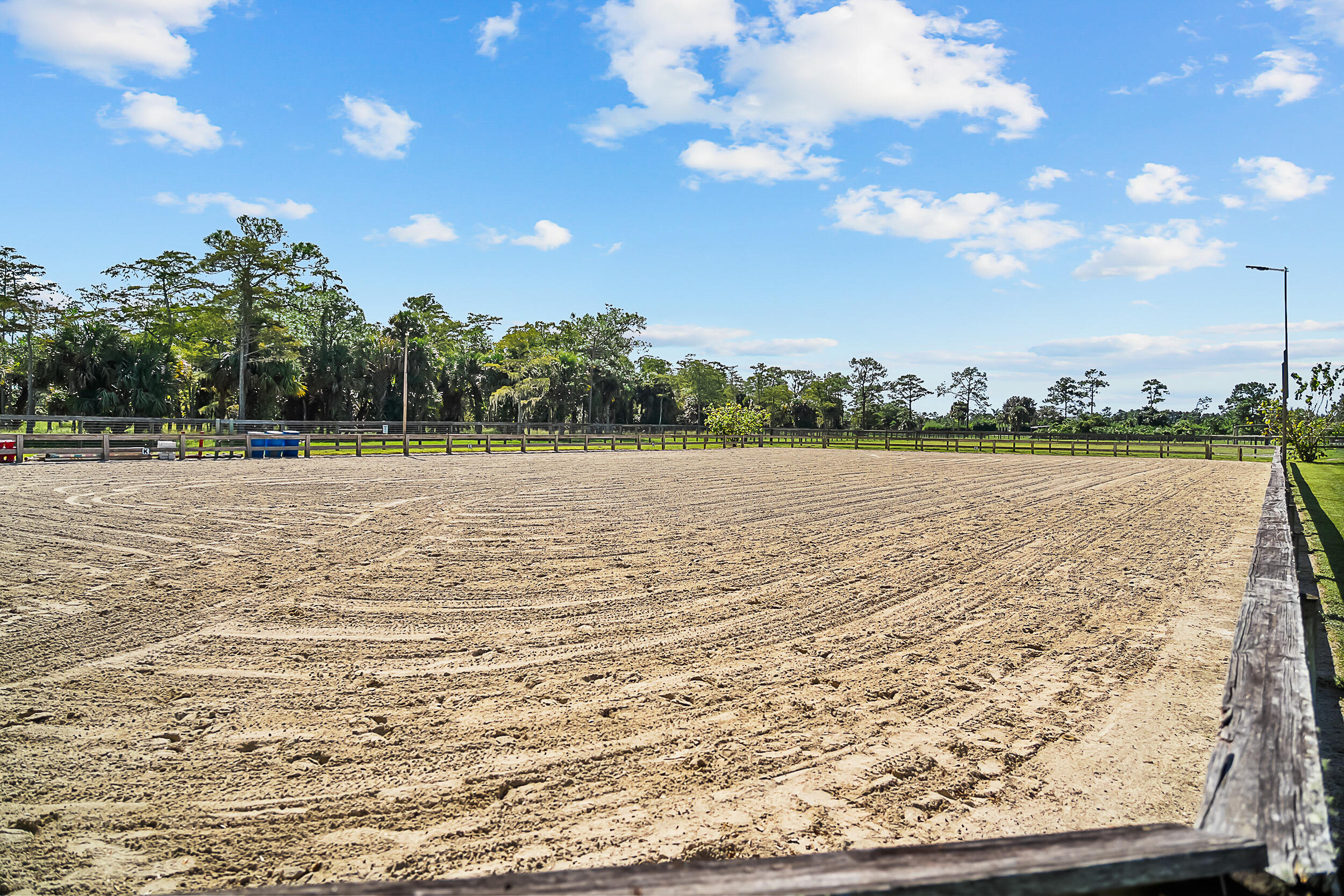 2986 Southwest Trailside Path Stuart, FL 34997 - Photo 25 of 40 a view of a swimming pool and an outdoor space