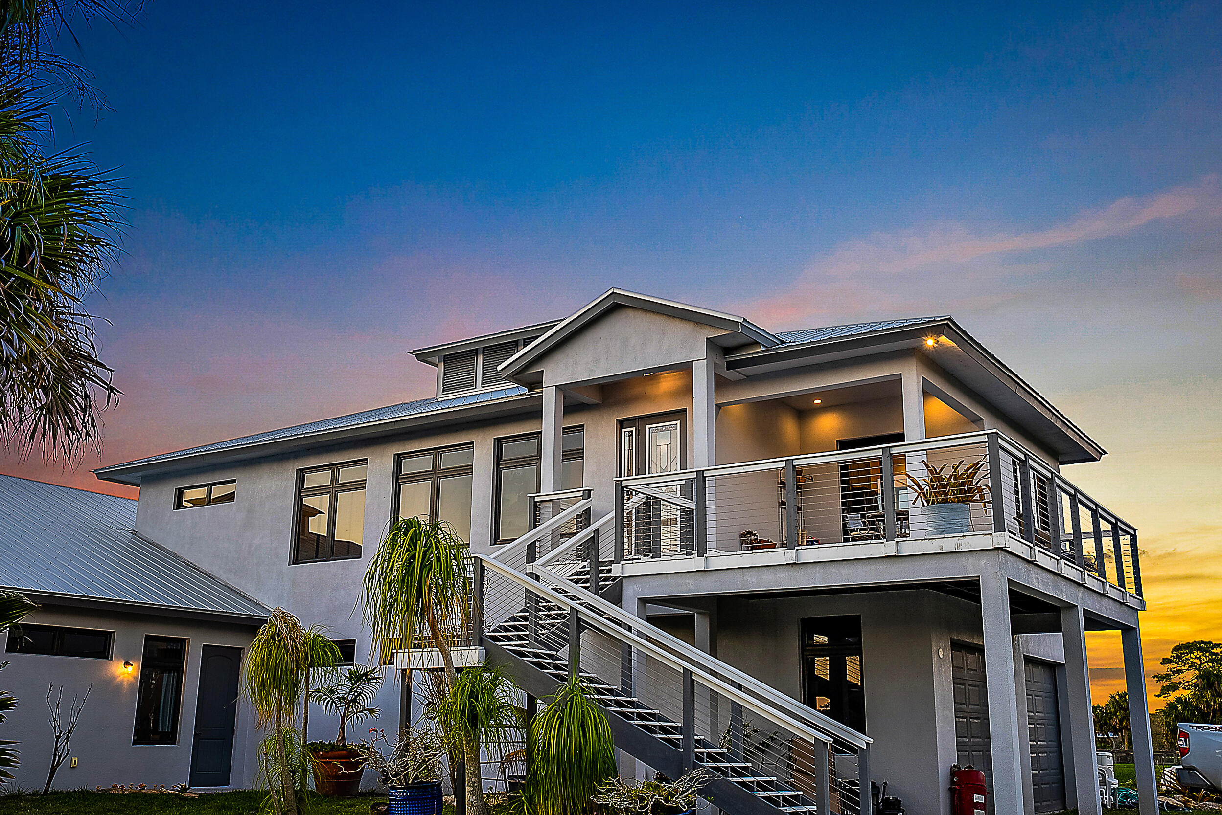 2986 Southwest Trailside Path Stuart, FL 34997 - Photo 28 of 40 a view of a house with a yard balcony