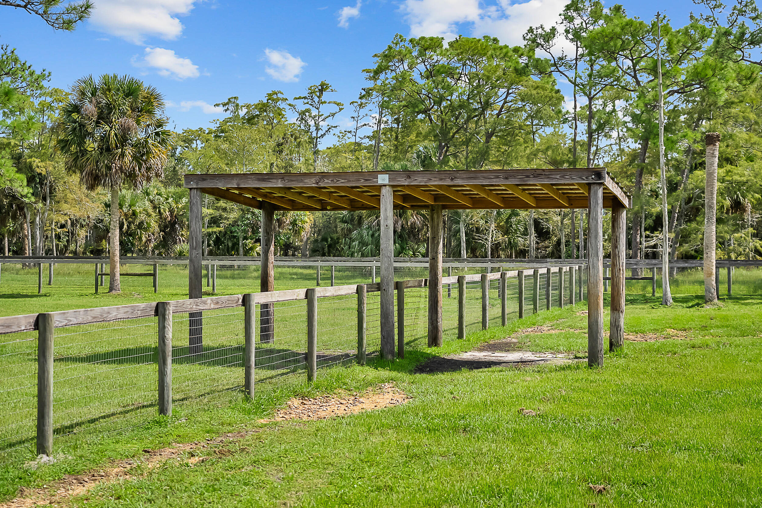 2986 Southwest Trailside Path Stuart, FL 34997 - Photo 30 of 40 a view of a park with swings