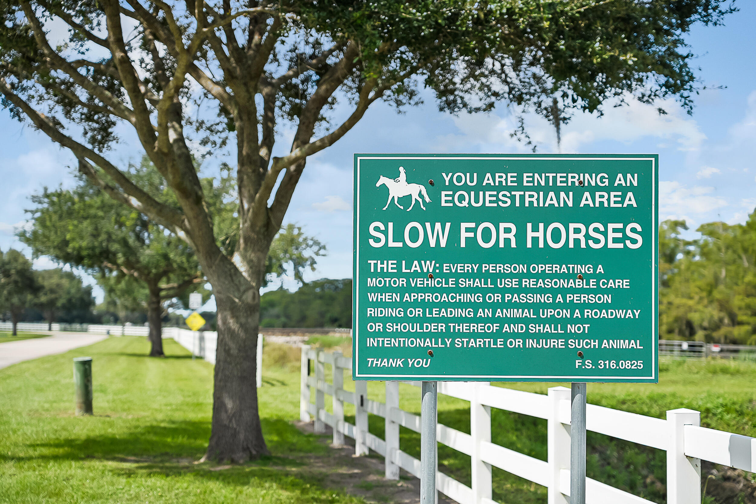 2986 Southwest Trailside Path Stuart, FL 34997 - Photo 37 of 40 a sign on the side of the building