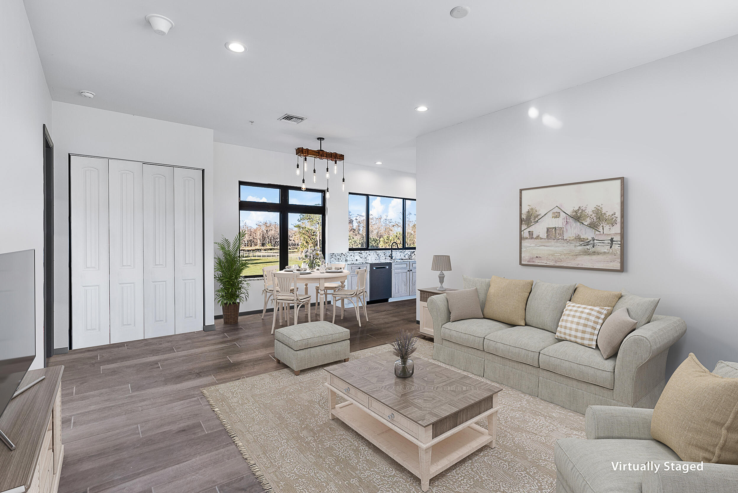 2986 Southwest Trailside Path Stuart, FL 34997 - Photo 8 of 40 a living room with furniture and wooden floor