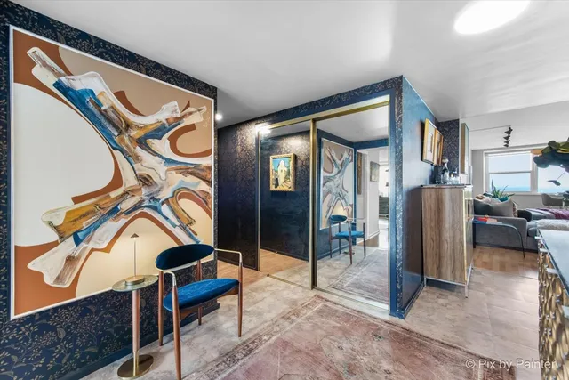 a view of a hallway with a couch