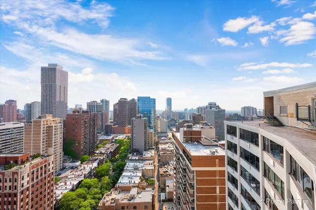 a view of a city with tall buildings