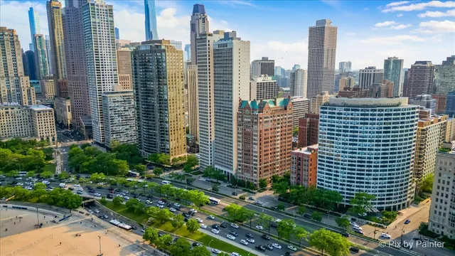 a view of a city with tall buildings