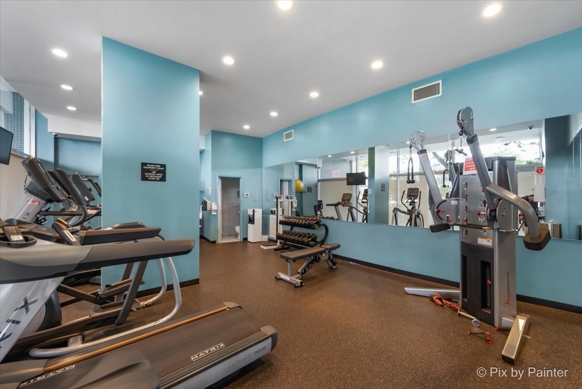 1150 North Lake Shore Drive, Unit 19A Chicago, IL 60611 - Photo 31 of 34 a view of a room with gym equipment