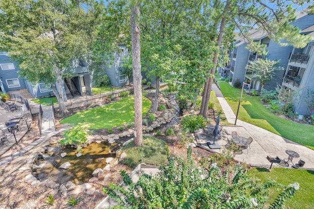 a view of a garden with a slide