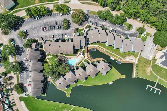 an aerial view of a house with a garden