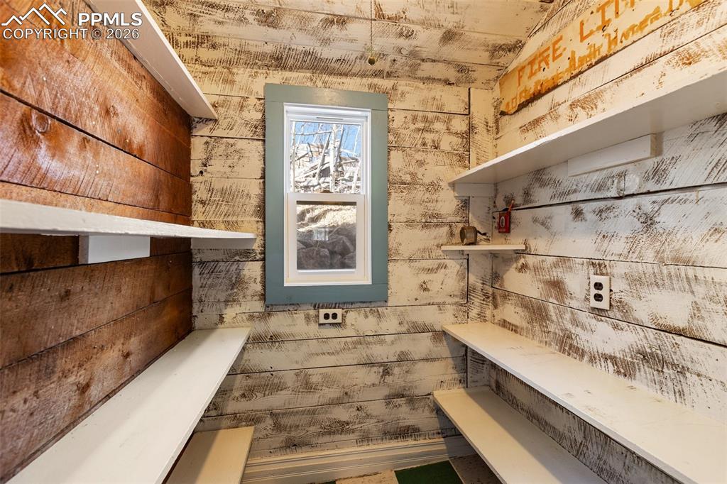 123 7th Street Victor, CO 80860 - Photo 17 of 44 a view of a bathtub and door with a roof