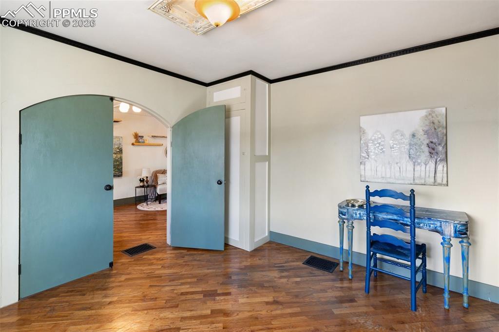 123 7th Street Victor, CO 80860 - Photo 25 of 44 a view of workspace with furniture and wooden floor