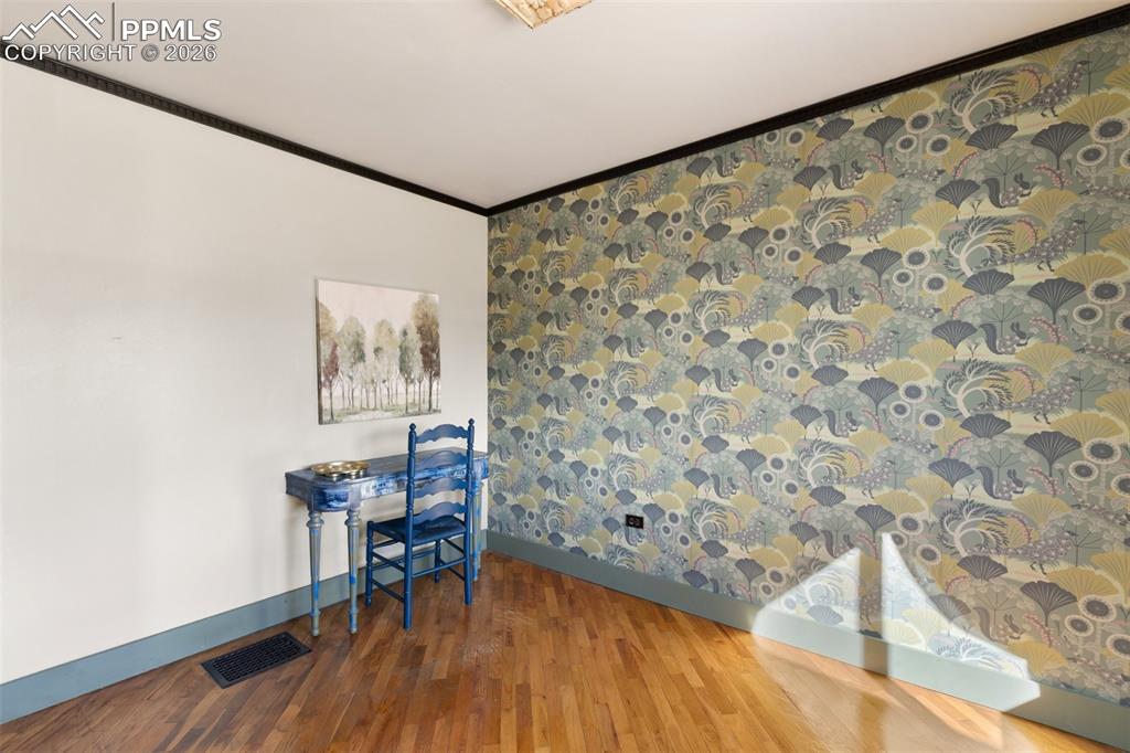 123 7th Street Victor, CO 80860 - Photo 26 of 44 a view of a livingroom with wooden floor and a chairs