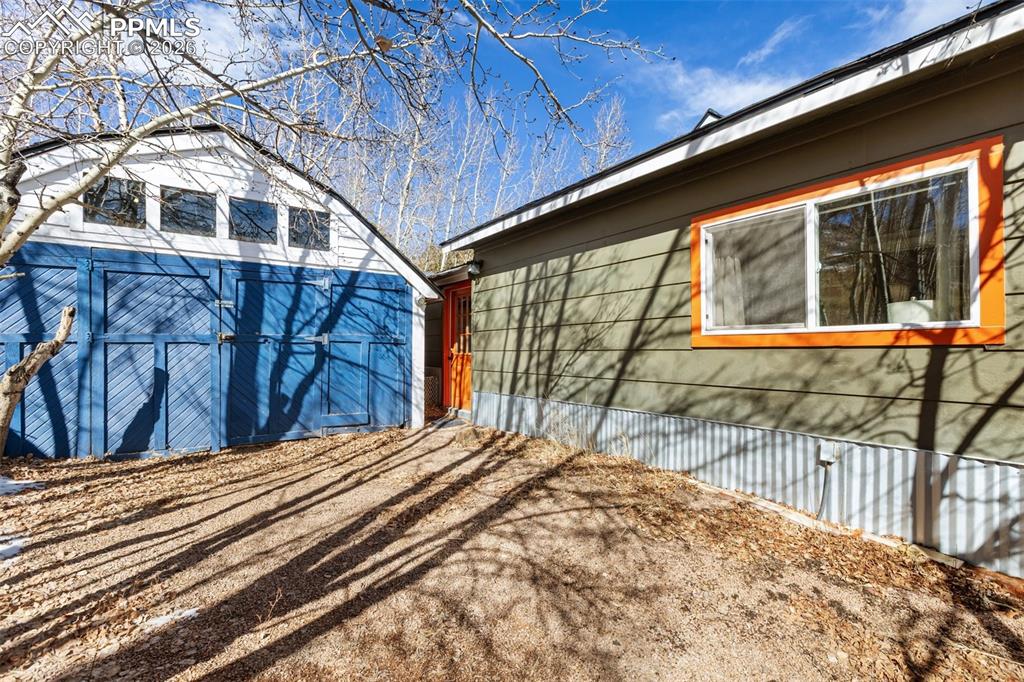 123 7th Street Victor, CO 80860 - Photo 35 of 44 a front view of a house with a yard