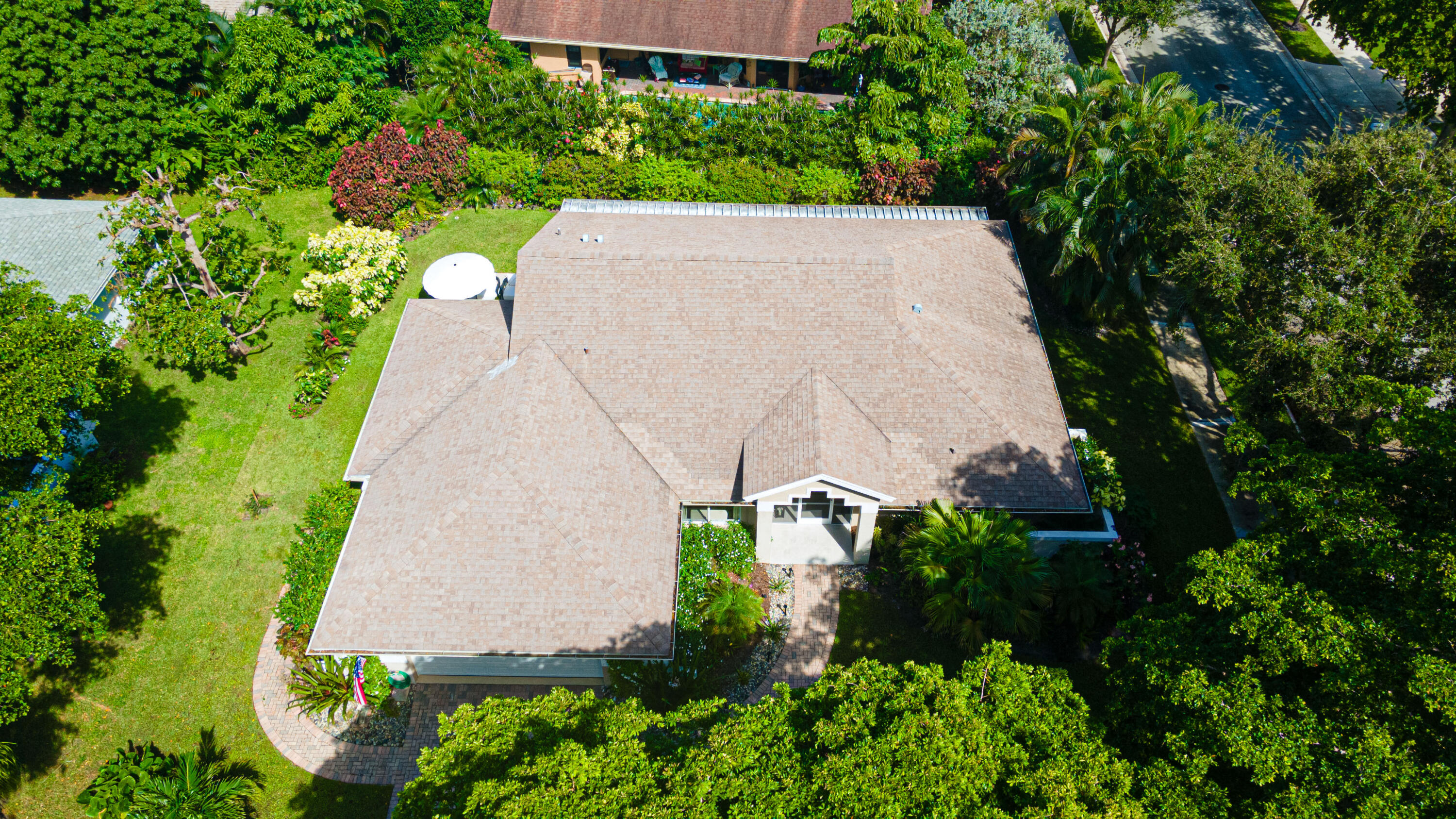 2477 Par Circle Delray Beach, FL 33445 - Photo 33 of 34 an aerial view of a house with a yard and garden