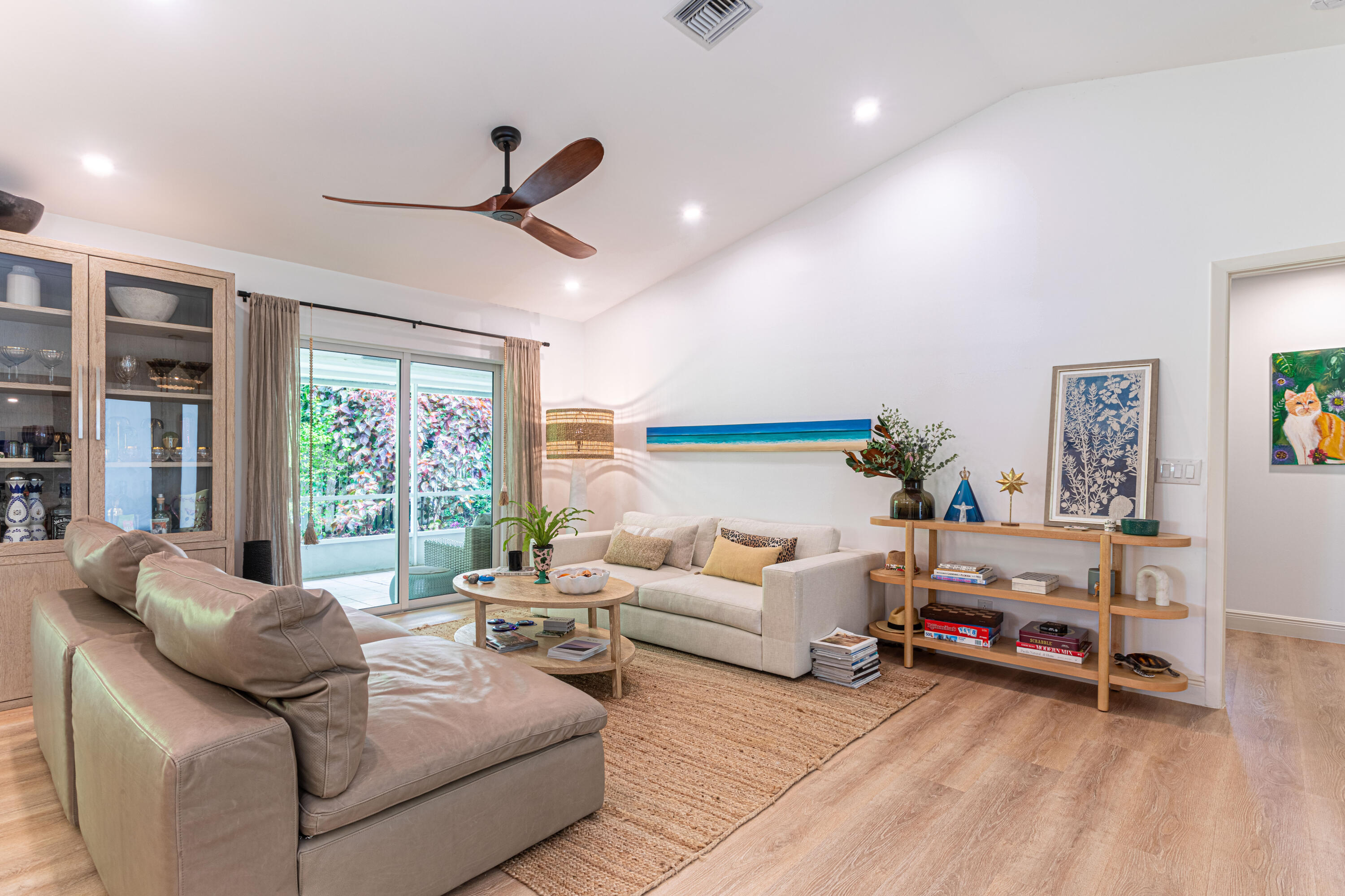 2477 Par Circle Delray Beach, FL 33445 - Photo 7 of 34 a living room with furniture and a large window