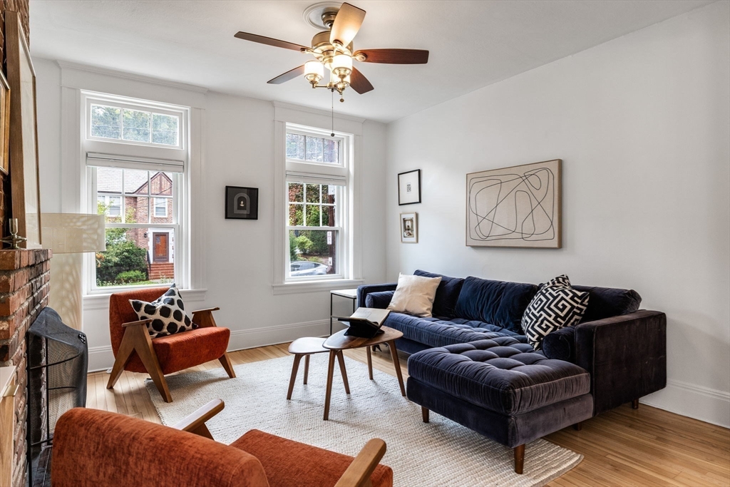 151 Longwood Avenue, Unit 1 Brookline, MA 02446 - Photo 6 of 34 a living room with furniture or couch and a window