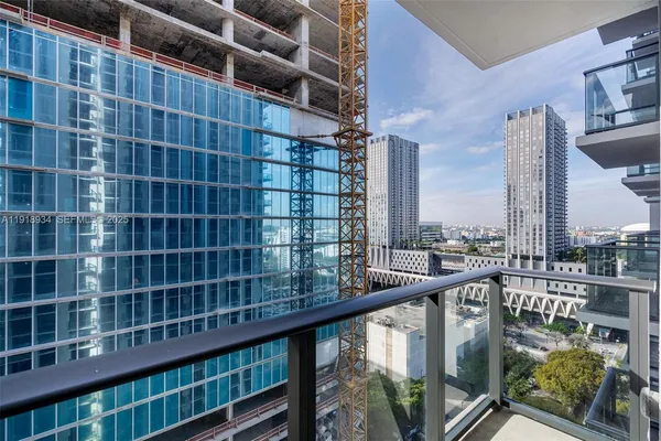 a view of a balcony with city view