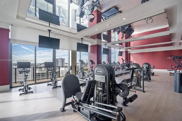 a view of a room with gym equipment