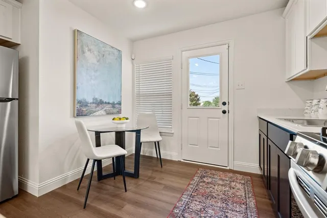 a view of a livingroom with furniture and window