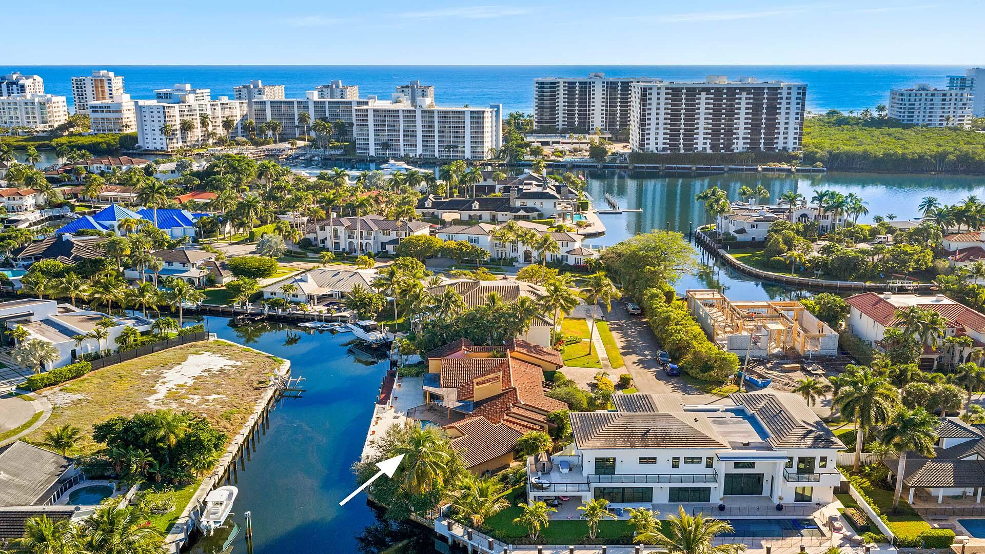 7401 Northeast Bay Cove Court Boca Raton, FL 33487 - Photo 7 of 13 a view of a city with tall buildings