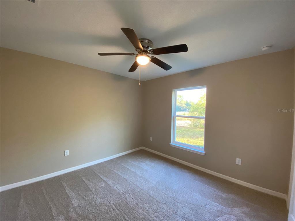 5366 Southwest 197th Terrace Dunnellon, FL 34431 - Photo 12 of 29 a view of an empty room with a window
