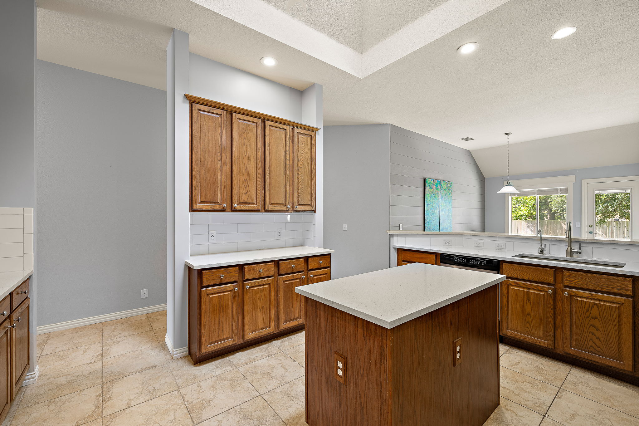 1102 Nelson Ranch Road Cedar Park, TX 78613 - Photo 16 of 37 A well-appointed kitchen showcasing an island and ample cabinetry for culinary pursuits.