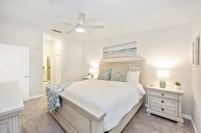 a view of an apartment with a backyard