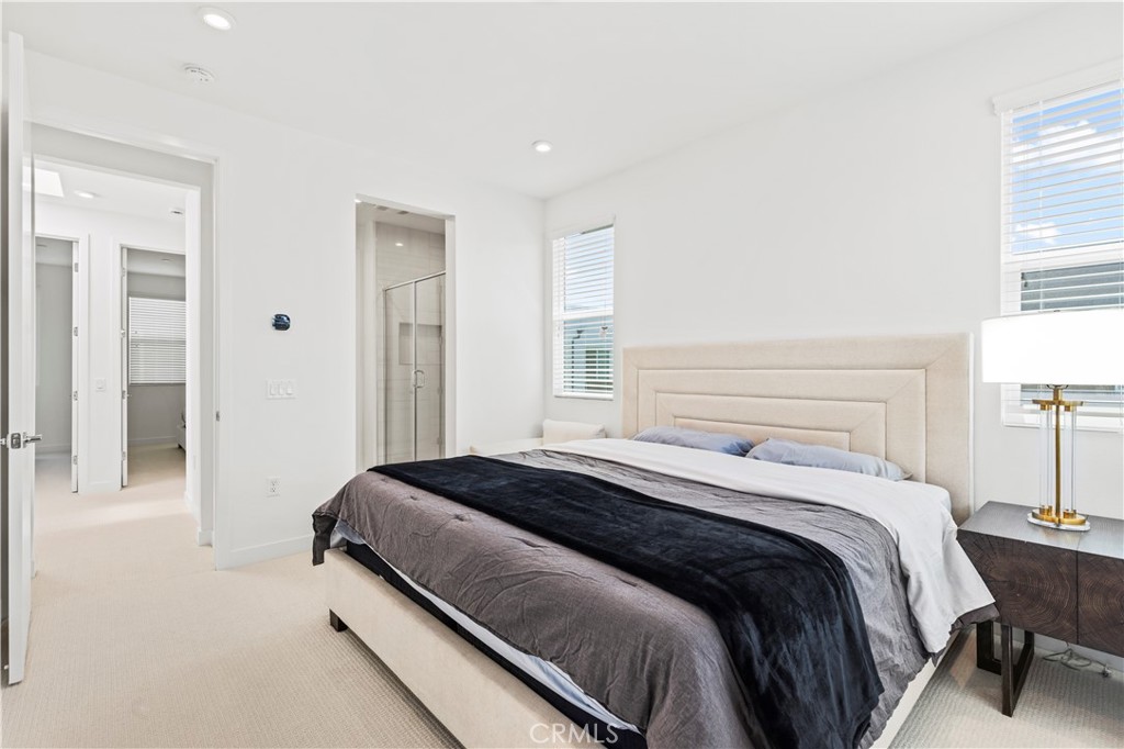 609 South Lyon Street Santa Ana, CA 92705 - Photo 15 of 52 a bedroom with a bed and a window