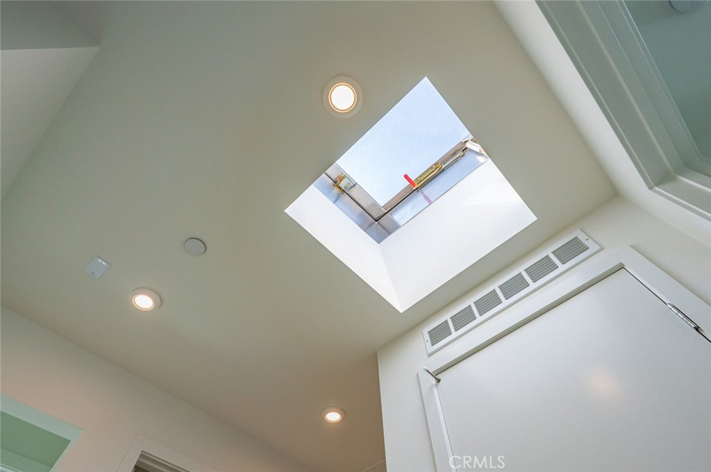 609 South Lyon Street Santa Ana, CA 92705 - Photo 20 of 52 a view of a hallway to a room with windows